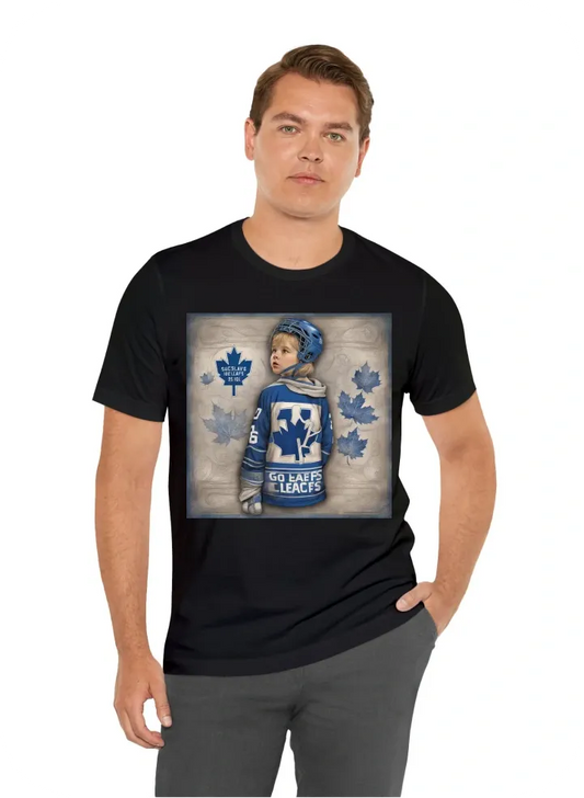 "GO LEAFS GO, I GUESS" text at the bottom of the design in the style of the Toronto Maple Leafs as they lose the NHL Stanley cup playoffs. I want to see a sad crying child on the shirt as the Leafs lose the game. This shirt should be so sad I want to cry.