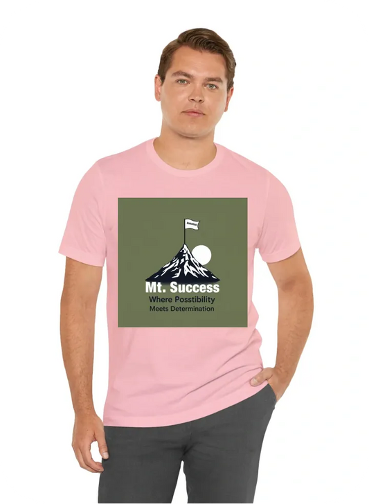 I want a t shirt with a graphic of a man climbing a mountain. The mountain should have a flag on top of it, that says "Mt. Success". Under the graphic, the quote "Where Possibility Meets Determination" should be written.