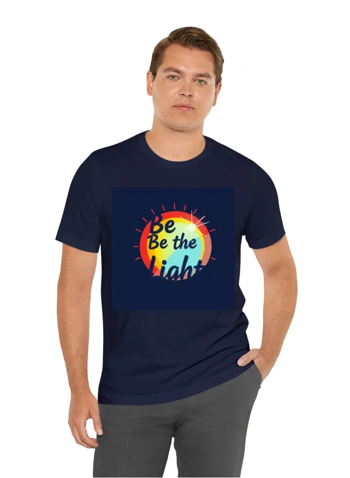 I want a t-shirt that says Be the Light with the colors red, orange, and blue