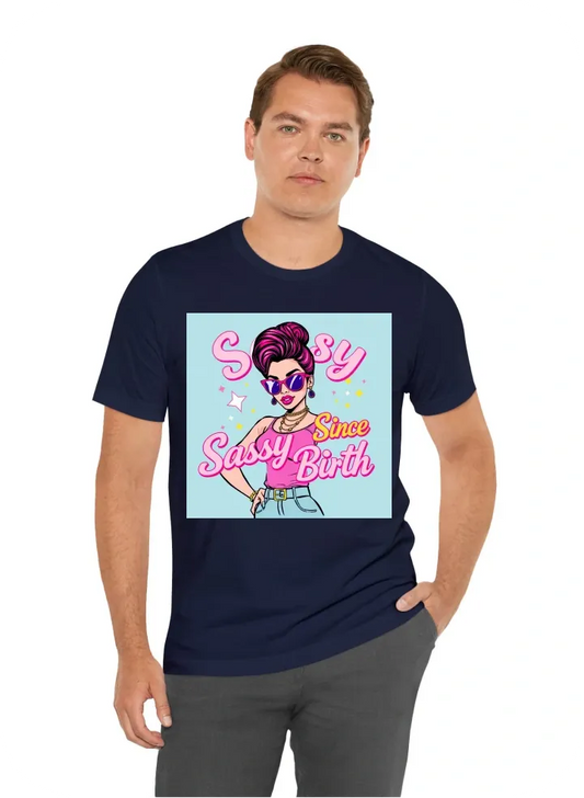 An illustration of a confident, sassy woman with one hand on her hip, wearing trendy sunglasses and a stylish outfit. The design includes bold, modern typography that says 'Sassy Since Birth' in a playful, cursive font. Vibrant colors like pink, purple, a