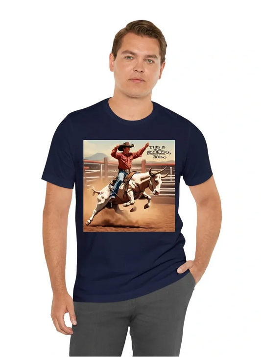 The words "this is my 2nd rodeo" and a picture of a cowboy riding a bucking bull on the front. The words "and that's not a lot of rodeos" with a bull bucking off a cowboy on the back