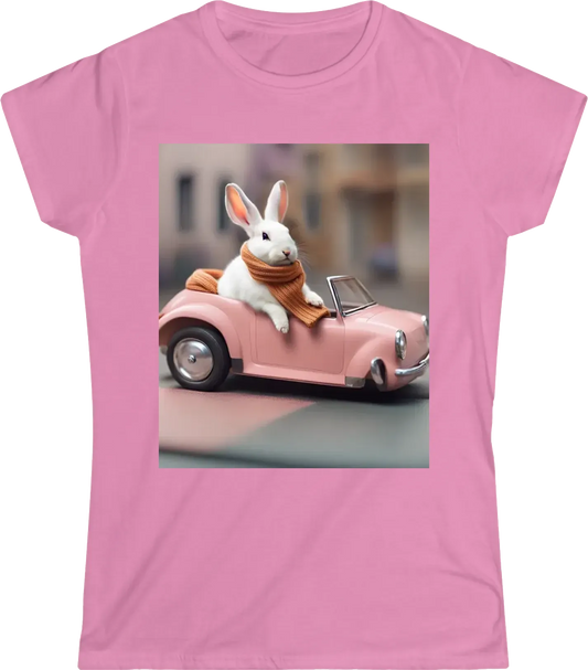 A rabbit sitting in a tiny convertible car, wearing a scarf