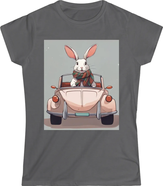 A rabbit sitting in a tiny convertible car, wearing a scarf