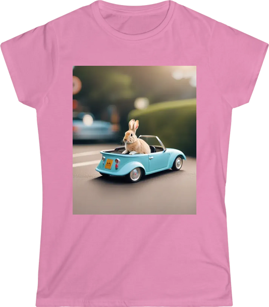 A rabbit sitting in a tiny convertible car